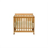 DaVinci Kalani Convertible Mini Wood Crib in Honey Oak Finish