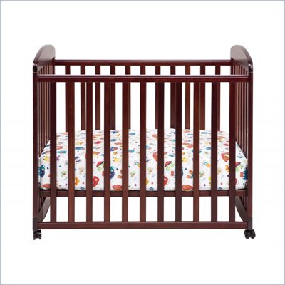 DaVinci Alpha Mini Rocking Wood Baby Crib in Cherry
