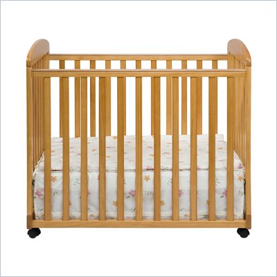 DaVinci Alpha Mini Rocking Mobile Wood Baby Crib in Honey Oak