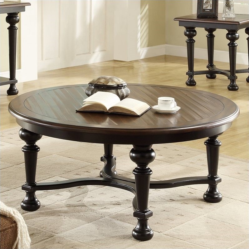 Riverside Furniture Williamsport Round Cocktail Table in Nutmeg/Kettle Black