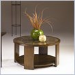 ADD TO YOUR SET: Hammary Marika Round Cocktail Table in Glazed Chestnut Finish
