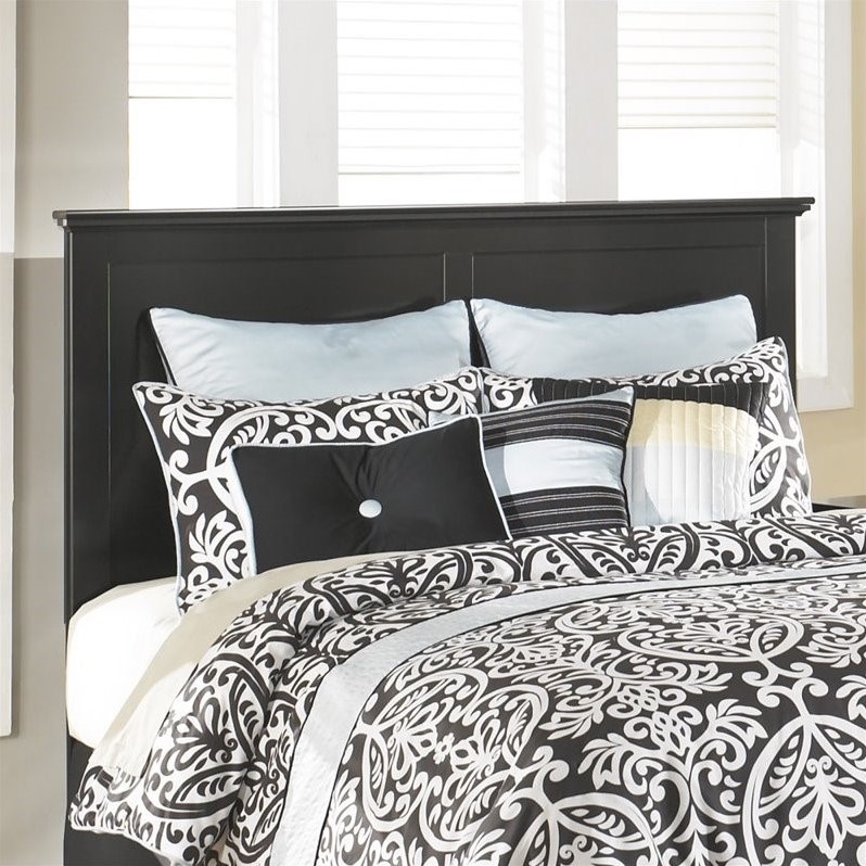 Ashley Furniture - Headboards - B13858 - With a relaxed cottage design that features beautiful frame details along with scalloped tops and base mouldings all bathed in a rich black finish, the &#8220;Maribel&#8221; bedroom collection creates an inviting atmosphere that is sure to transform the d&#233;cor of any bedroom. Solid black finish. Casual cottage design accented with pewter color knobs for a more urban look. Scalloped top and base mouldings add dimensional flare to case perimeters. Side roller glides for smooth operating drawers. Finish: Black; Style: Vintage Casual. Specifications:Twin Headboard Dimensions: 42.8&#8221; W x 2.6&#8221; D x 53.39&#8221; H; Twin Headboard Weight: 45 lbs; Full Headboard Dimensions: 57.8&#8221; W x 2.6&#8221; D x 53.39&#8221; H; Full Headboard Weight: 55 lbs; Full-Queen Headboard Dimensions: 64.8&#8221; W x 2.6&#8221; D x 53.39&#8221; H; Full-Queen Headboard Weight: 59 lbs; King-California King Headboard Dimensions: 81.3 W x 2.6 D x 53.5 H; King-Ca