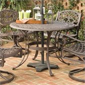 Home Styles Round Outdoor Dining Table in Rust Brown Finish