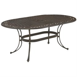Home Styles Biscayne Oval Outdoor Dining Table in Rust Finish