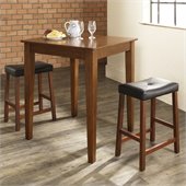 Crosley Furniture 3 Piece Pub Dining Set with Tapered Leg and Upholstered Saddle Stools in Classic Cherry Finish