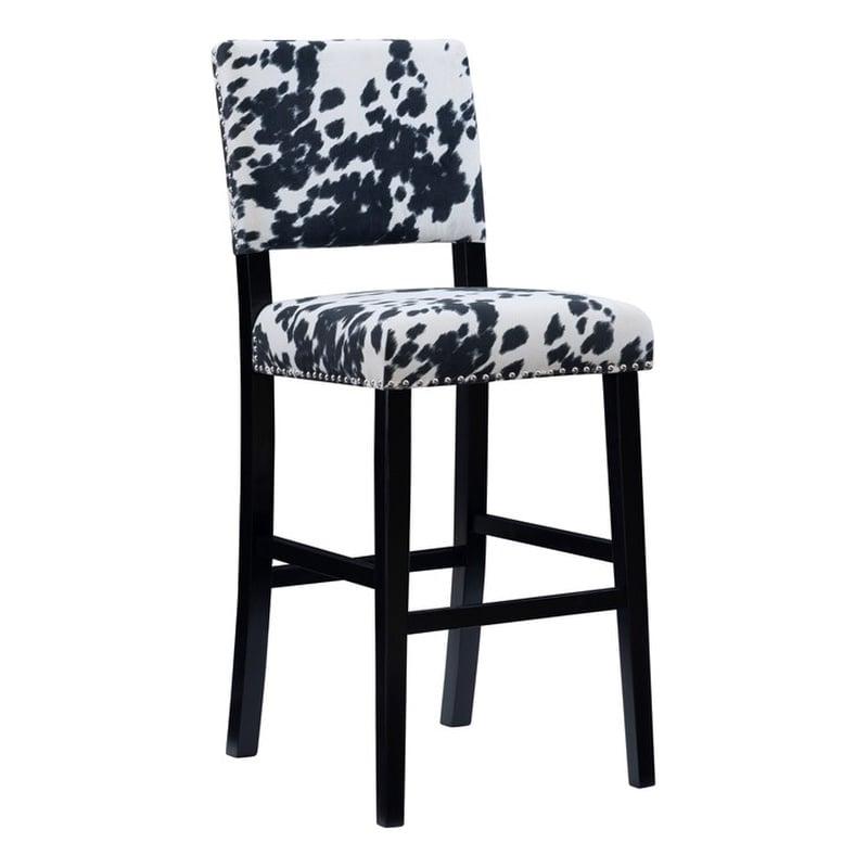 black and white cow print bar stools