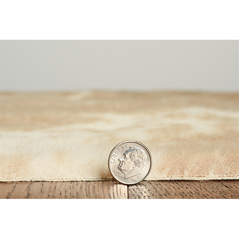 Linon Faux Hide Polyester Cowhide Tufted Printed Area Rug in Caramel and Cream