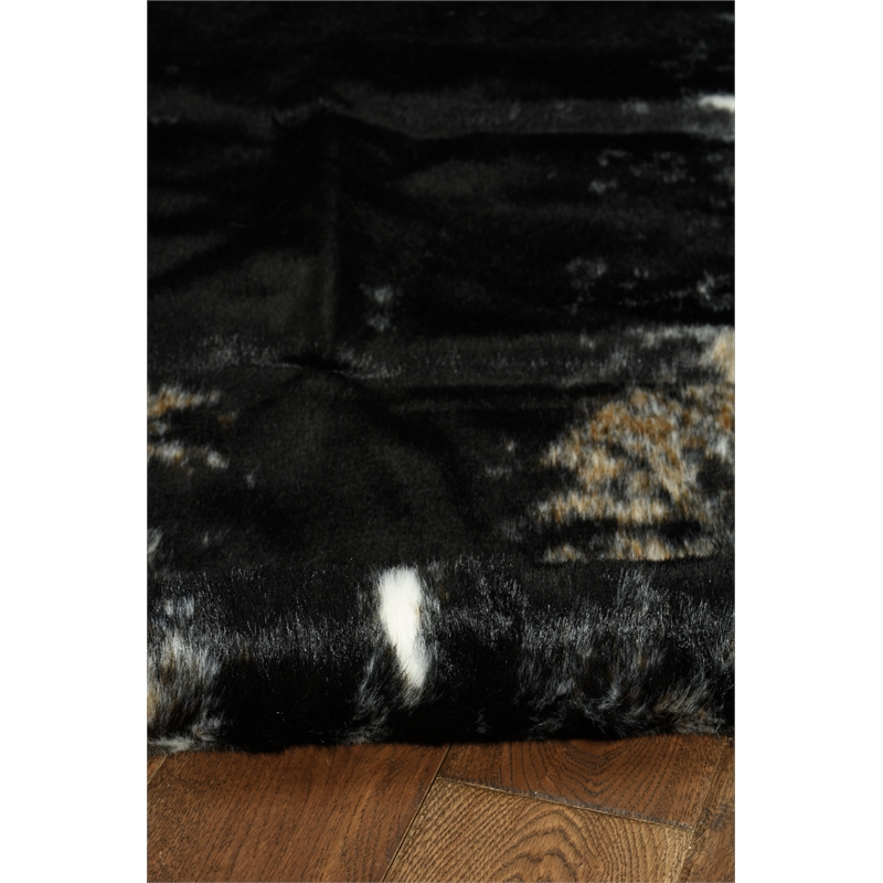 Linon Faux Hide Polyester Mini Cowhide Accent Rug in Black and White