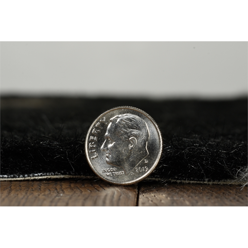 Linon Faux Hide Polyester Mini Cowhide Accent Rug in Black and White