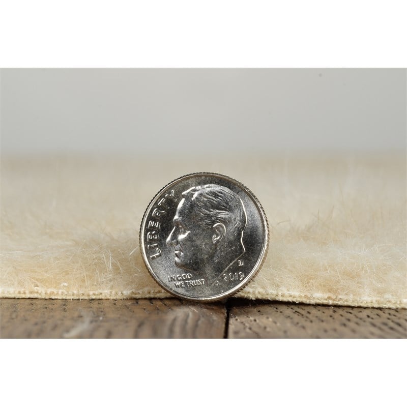 Linon Faux Hide Polyester Mini Cowhide Accent Rug in Ivory