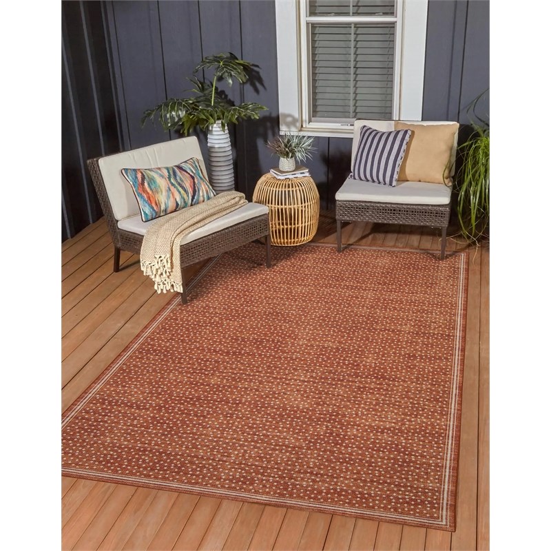 Linon Indoor Outdoor Machine Washable Hama Area 5'x7' Rug in Orange and Ivory