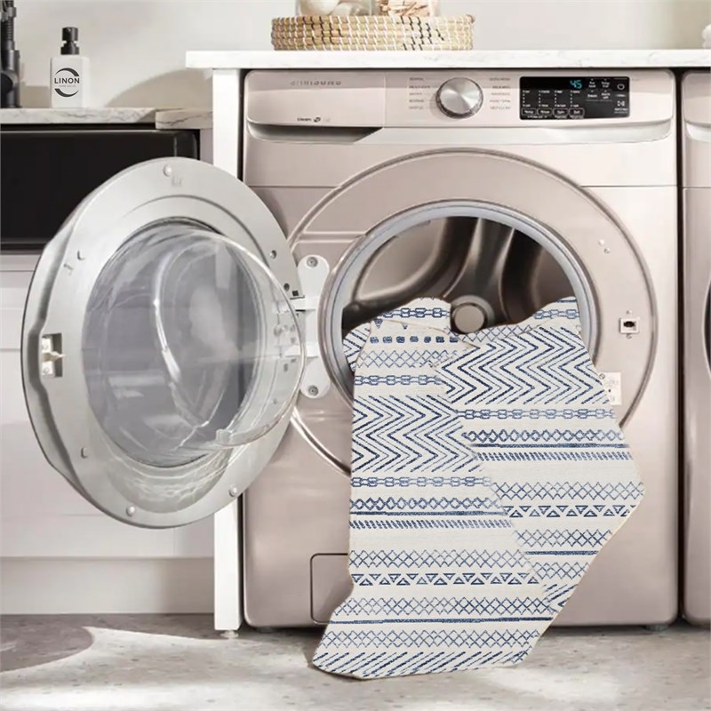 Linon Indoor Outdoor Machine Washable Skip Area 7'x9' Rug in Ivory and Blue