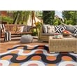 Linon Indoor Outdoor Machine Washable Adira Area 7'x9' Rug in Orange and Pink