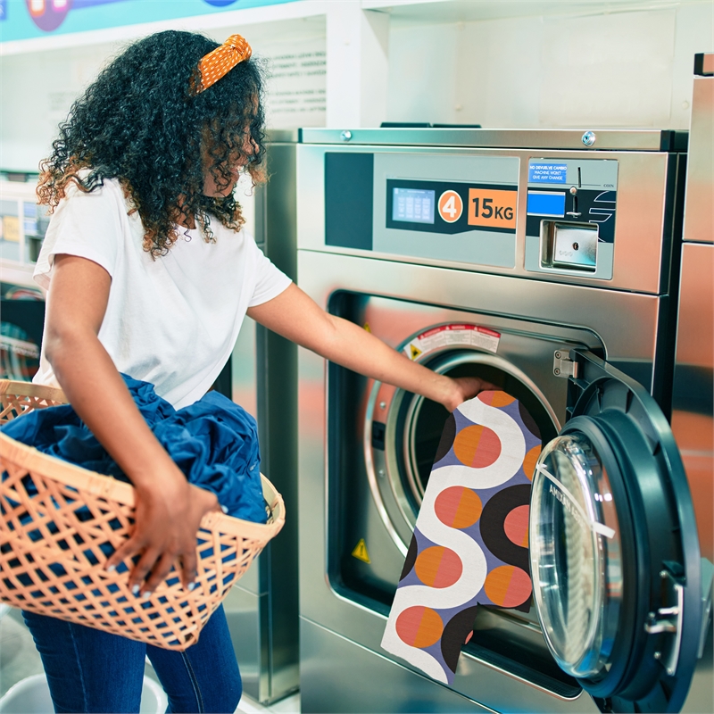 Linon Indoor Outdoor Machine Washable Adira Area 7'x9' Rug in Orange and Pink