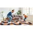 Linon Indoor Outdoor Machine Washable Adira Area 7'x9' Rug in Orange and Pink