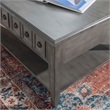 Linon Sadie Coffee Table with 3 Drawers and Bottom Shelf in Gray Distressed Wood