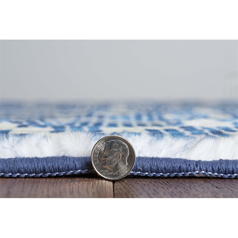 Linon Motif Printed Faux Rabbit Linear Polyester 5'x7' Area Rug in Blue