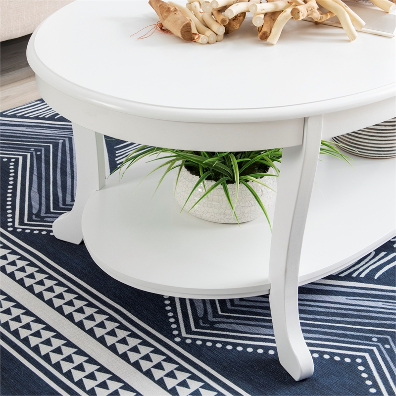 Linon Merce Wood Oval Coffee Table with Shelf in White Painted Finish