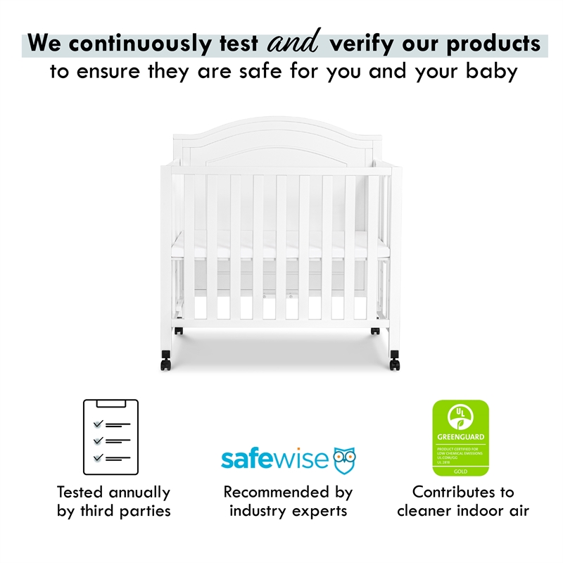Davinci Charlie Pine Wood and MDF Folding Portable 3-In-1 Mini Crib in White