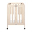 Babyletto Origami Portable Folding Mini Crib with Casters in Washed Natural