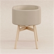 babyletto x GATHRE Bonded Vegan Leather Capsule Shaped Bassinet in Millet