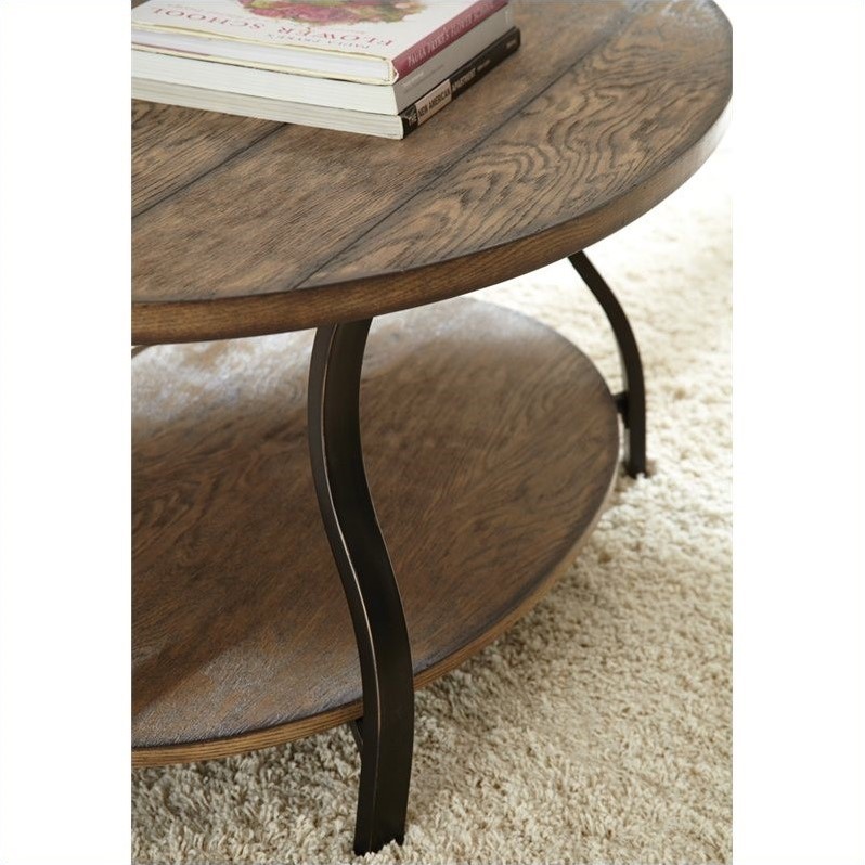 Steve Silver Company Denise Oval Cocktail Table in Light Oak Finish