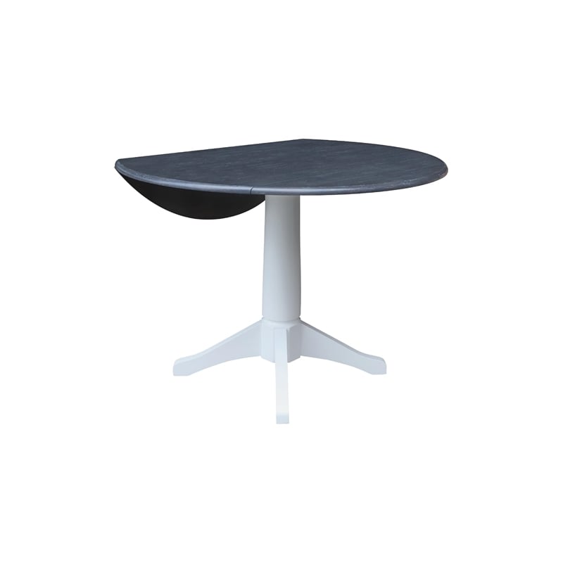International Concepts 42 In Round dual drop Leaf Pedestal Table  30.3 
