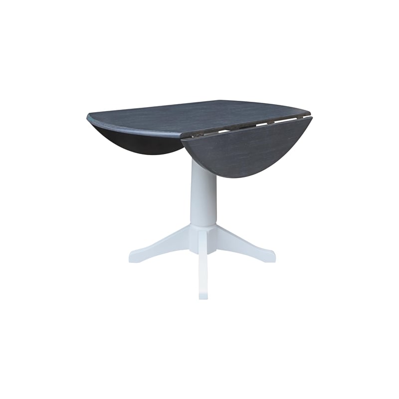 International Concepts 42 In Round dual drop Leaf Pedestal Table  30.3 
