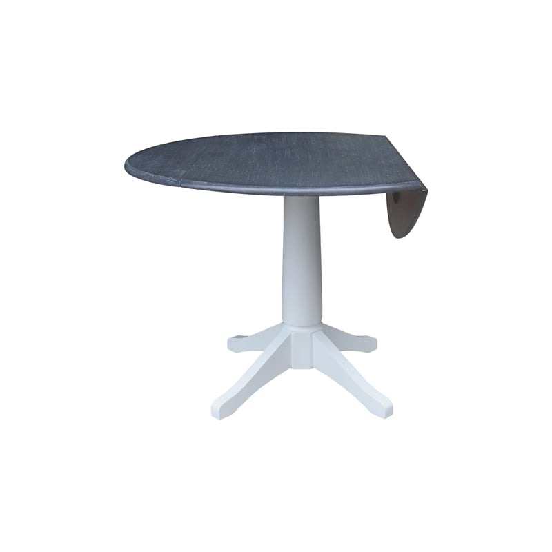 International Concepts 42 In Round dual drop Leaf Pedestal Table  30.3 