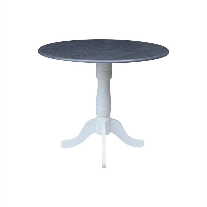International Concepts 42 In Round dual drop Leaf Pedestal Table 35.5 