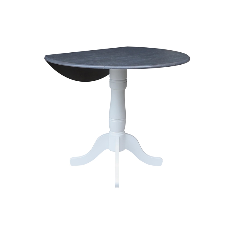 International Concepts 42 In Round dual drop Leaf Pedestal Table 35.5 