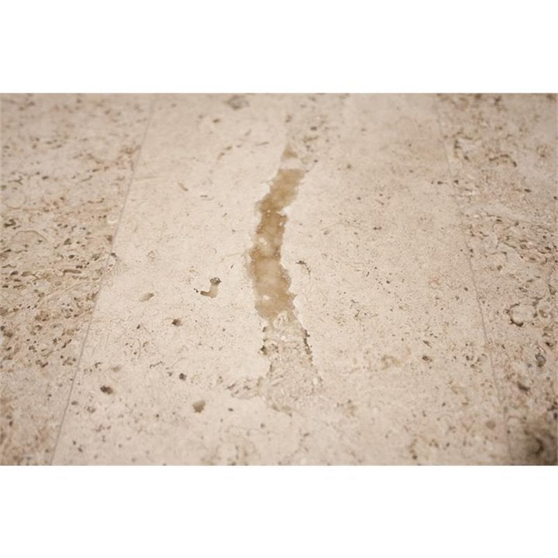 Riverside Furniture Capri Round Travertine Stone Top Coffee Table in Alabaster