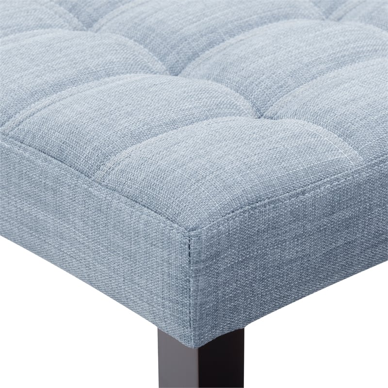 light blue tufted bench