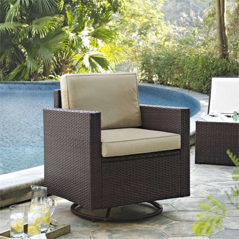 Crosley Furniture Palm Harbor Wicker / Rattan Swivel Patio Arm Chair in Sand