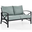 Crosley Furniture Kaplan Metal Patio Loveseat in Oil Bronze and Mist Green