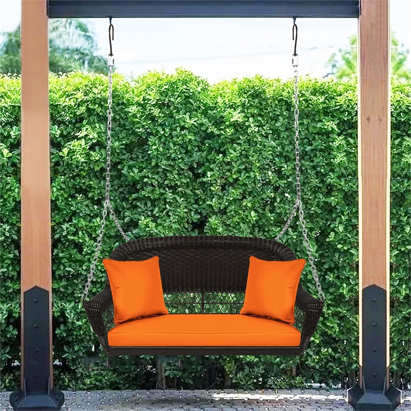 Jeco Wicker Porch Swing in Espresso with Orange Cushion