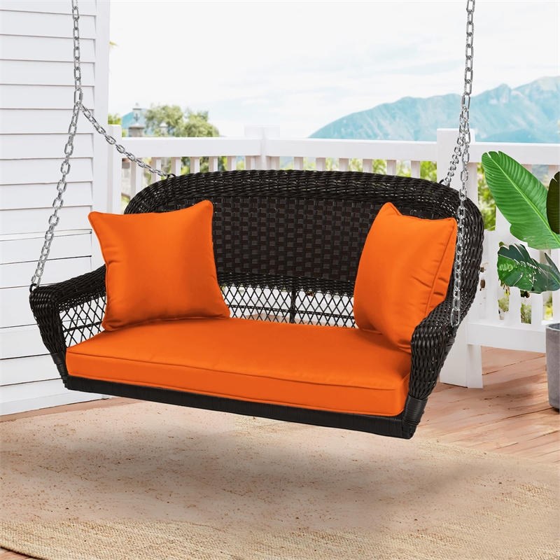 Jeco Wicker Porch Swing in Espresso with Orange Cushion