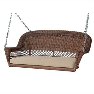 Jeco Honey Resin Wicker Hanging Porch Swing with Cushion in Tan