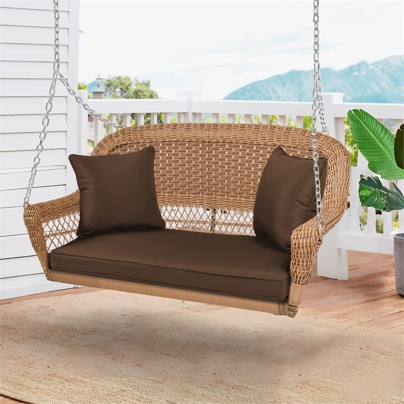 Jeco Honey Resin Wicker Hanging Porch Swing with Cushion in Brown