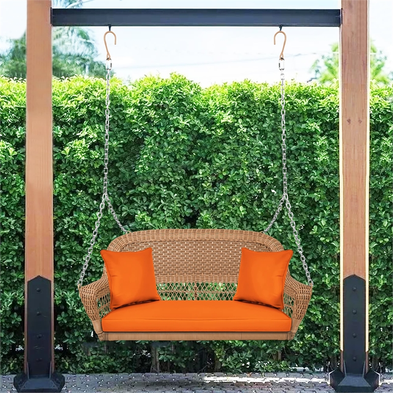 Jeco Honey Resin Wicker Hanging Porch Swing with Cushion in Orange