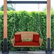 Jeco Honey Resin Wicker Hanging Porch Swing with Cushion in Red