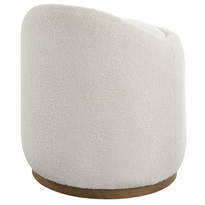 Uttermost Swirl Swivel Sheepskin Ottoman in Off White
