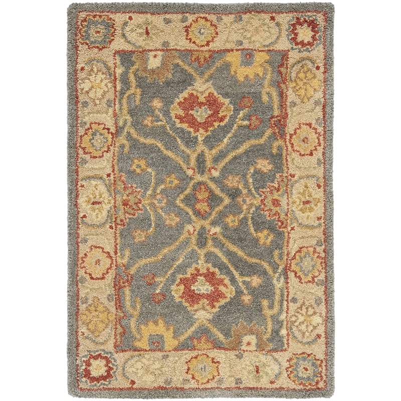 Safavieh Antiquity 12' X 18' Hand Tufted Wool Rug in Blue and Ivory