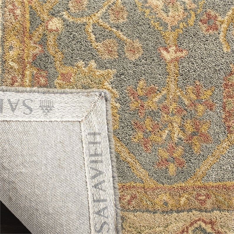 Safavieh Antiquity 12' X 18' Hand Tufted Wool Rug in Blue and Ivory