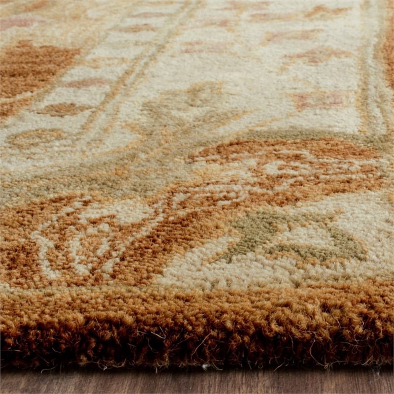 Safavieh Antiquity 3' X 5' Hand Tufted Wool Rug in Brown and Beige