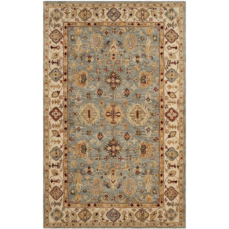 Safavieh Antiquity 5' X 8' Hand Tufted Wool Rug in Blue and Ivory