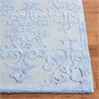 Safavieh Bella 5' Round Hand Tufted Wool Rug in Sand and Ivory