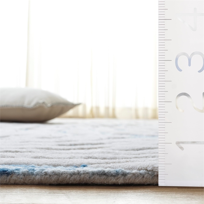 Safavieh Bella 6' X 9' Hand Tufted Wool Rug in Dark Blue and Ivory