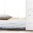 Safavieh Bella 6' X 9' Hand Tufted Wool Rug in Dark Blue and Ivory