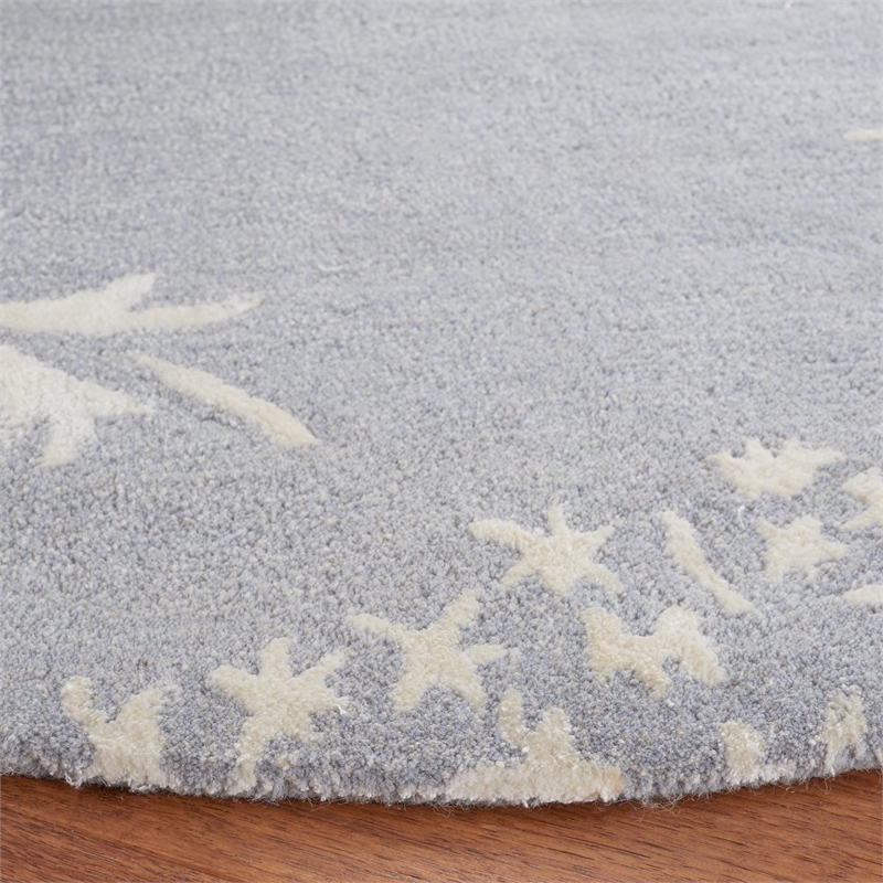 Safavieh Bella 5' Round Hand Tufted Wool Rug in Sand and Ivory